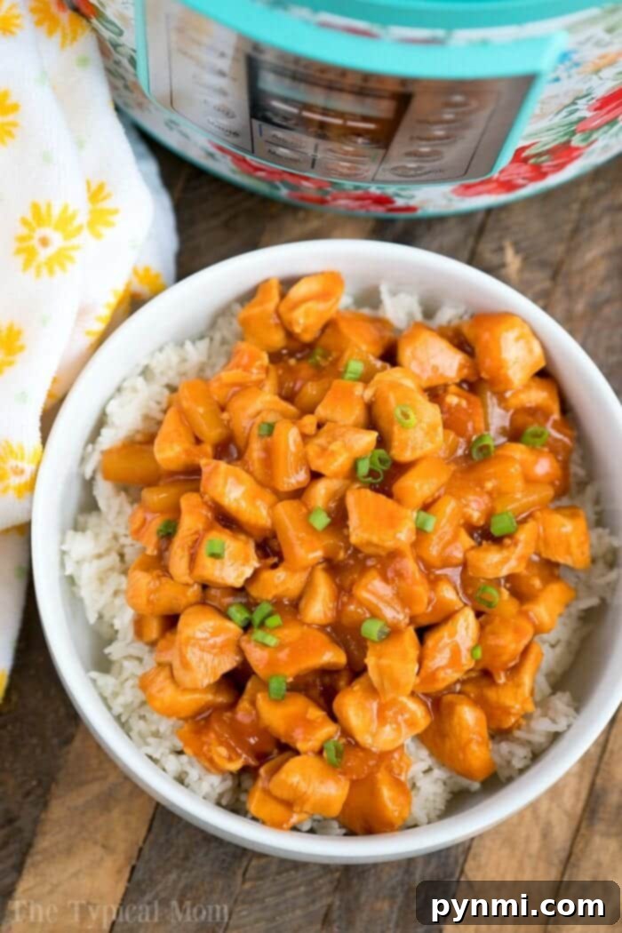Instant Pot Hawaiian chicken is pineapple sweet with a bit of a kick. Served on top of rice or by itself it's one of our favorite pressure cooker dinners! #instantpotrecipes #instantpot #chicken #pineapple #hawaiian #sweet #thetypicalmom #ninjafoodirecipes instant pot hawaiian chicken 3