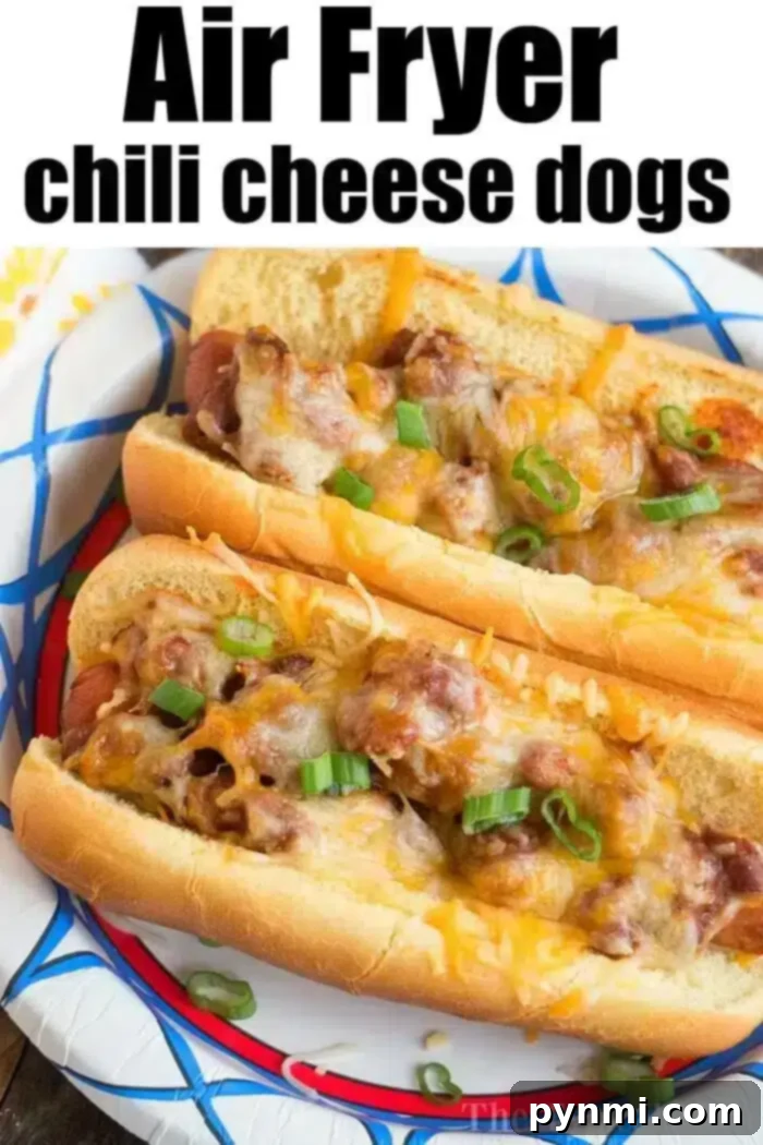 Air Fryer hot dogs or chili dogs are the perfect quick dinner idea our whole family loves! Load your buns up with toppings & they come out nice & crispy. #airfryer #hotdogs #chilidogs #ninjafoodi #ninjafoodirecipes A beautifully plated chili cheese hot dog, generously topped with melted cheese and chopped green onions, showcasing a delicious air fryer creation.