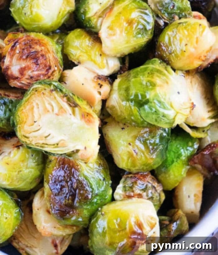 Crispy Air Fryer Brussels Sprouts Cooking Guide 2 Crispy air fryer Brussels sprouts perfectly cooked in a Ninja Foodi, ready to be served.