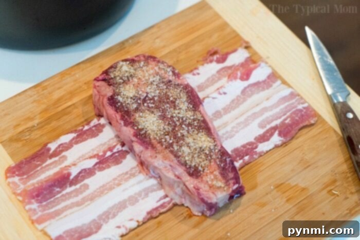 Perfectly cooked air fryer steak, ready to be sliced and served.