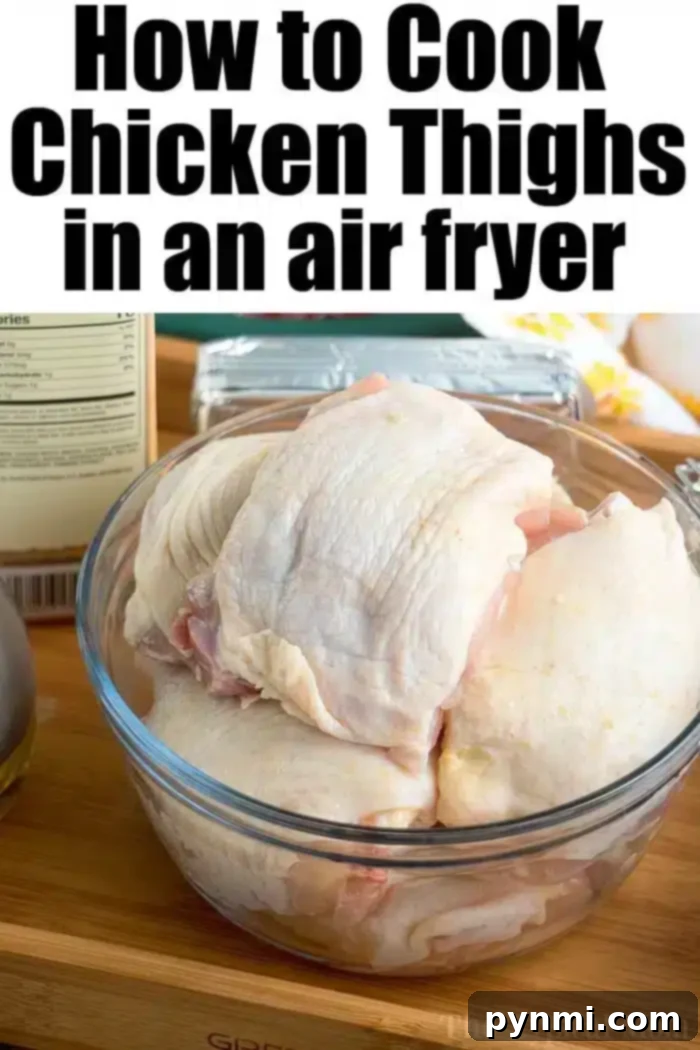 Best air fryer chicken thighs ever! Use this dry rub for chicken to make sweet and crispy chicken in an air fryer that's tender and juicy inside. Yum! #airfryerrecipes #airfryer #ninjafoodirecipes #ninjafoodi #chickenthighs #chicken #crispy A clear glass bowl filled with raw bone-in chicken thighs is placed on a wooden surface. Behind the bowl, there is a package of butter, a bottle of olive oil, and other kitchen items. The text at the top reads "How to Cook Chicken Thighs in an Air Fryer.