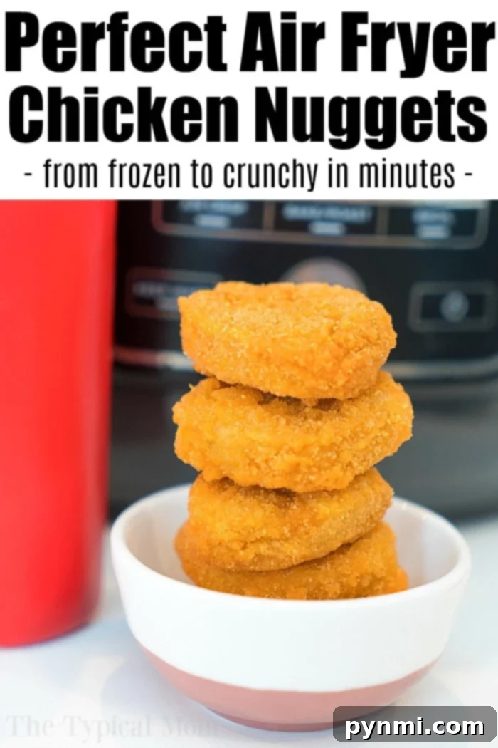 A vibrant close-up of golden, crispy air fryer frozen chicken nuggets, perfectly cooked and ready to eat, scattered invitingly.