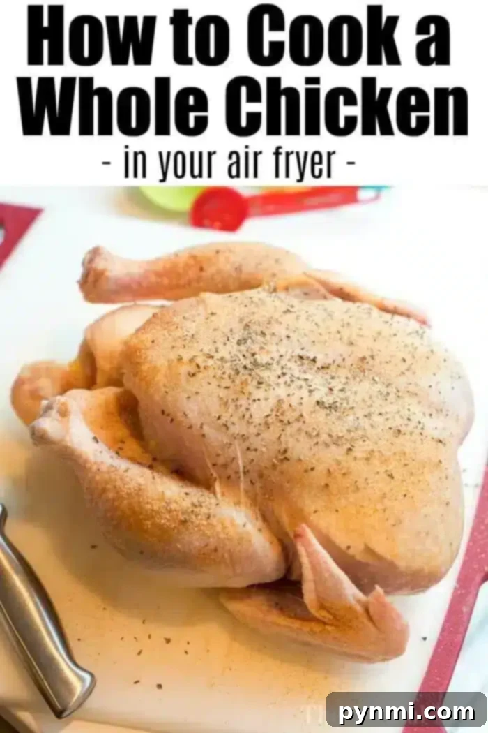 A seasoned raw whole chicken is placed on a cutting board with a knife nearby. The text on the image reads, "How to Cook an Air Fryer Whole Chicken."