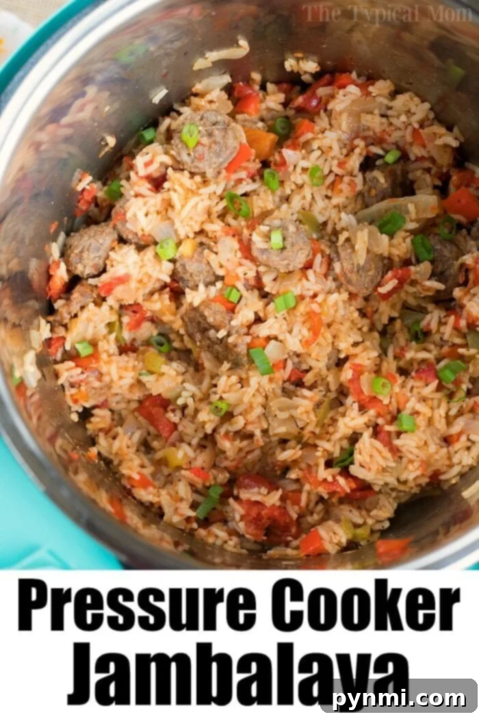 A steaming pot of hearty jambalaya, brimming with rice, tender meat, and vibrant vegetables, all perfectly cooked in a pressure cooker.