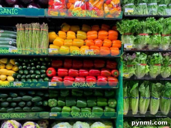 The impressive interior of a modern grocery store, highlighting its diverse fresh produce and meat sections, perfect for sourcing jambalaya ingredients