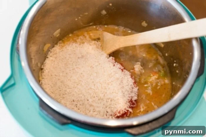 Close-up of pressure cooker jambalaya, showcasing its rich color and hearty texture