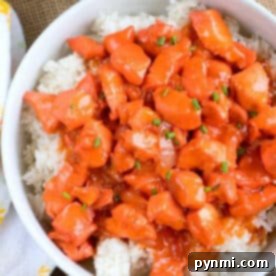 Golden Apricot Chicken Pronto 2 Bowl of white rice topped with pressure cooker apricot chicken, garnished with chopped green onions.