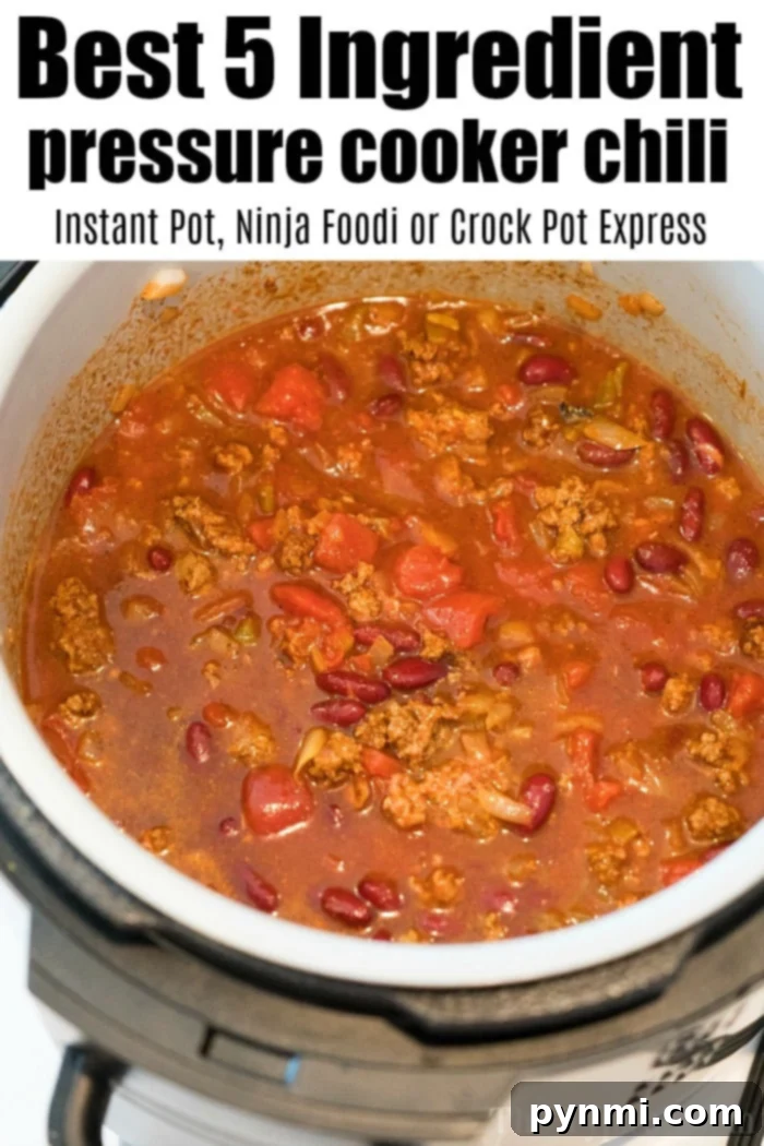 Perfectly Fluffy Ninja Foodi Rice 5 Pressure cooker with a cheesy twist, combining ground meat, beans, tomatoes, and pasta. Text reads: Best 5 Ingredient pressure cooker cheesy chili mac - Instant Pot, Ninja Foodi or Crock Pot Express.