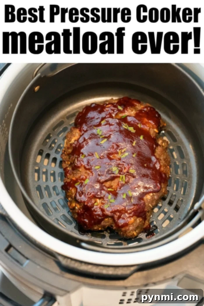 Pressure cooker meatloaf in a Ninja Foodi, showcasing its juicy interior and crispy topping.