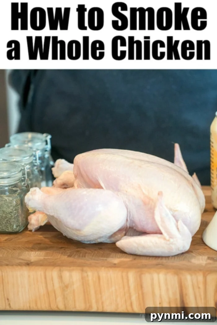 How to Smoke a Chicken - A raw whole chicken being prepped on a cutting board, ready for the smoker.