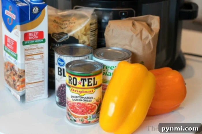 A vibrant Ninja Foodi casserole, brimming with corn, black beans, ground meat, and pasta, promises a comforting and easy one-pot meal perfect for any busy evening.