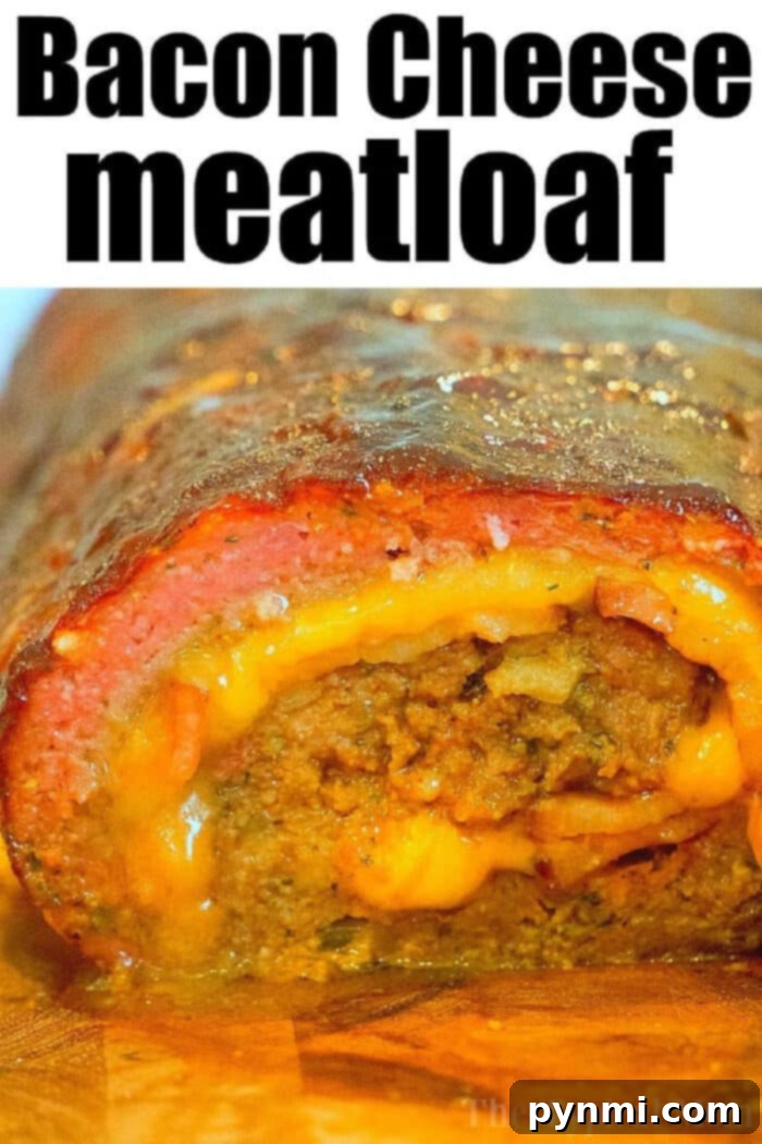 A freshly sliced, smoked meatloaf, showcasing its moist texture and the golden-brown crust. This view emphasizes the deliciousness of a perfectly cooked smoked meatloaf recipe, ready to be served.