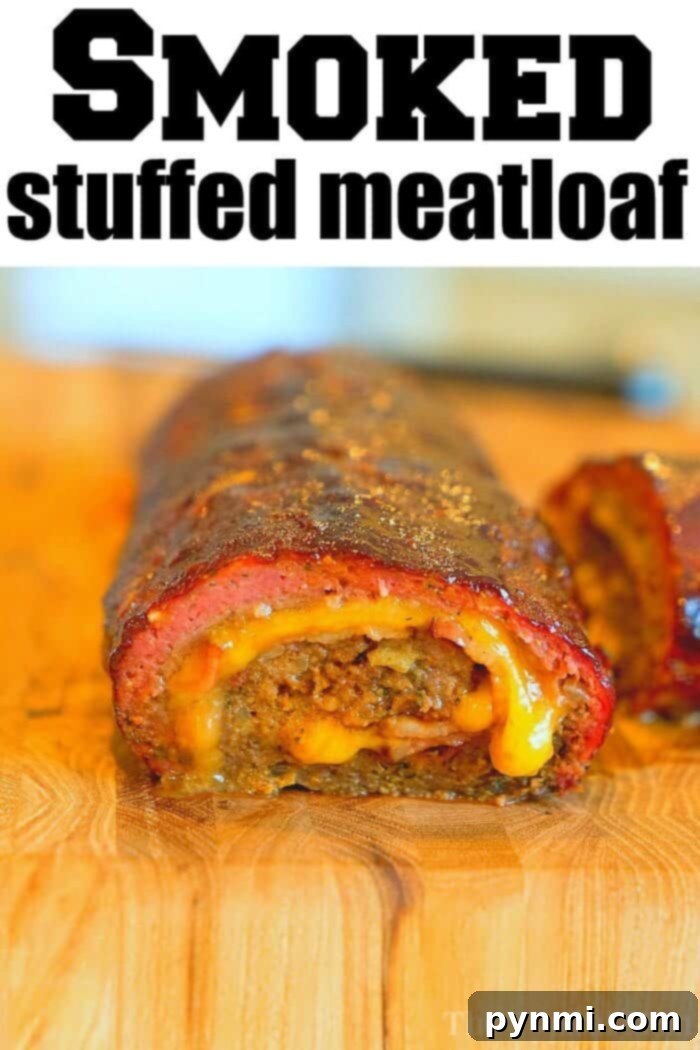 A whole smoked bacon meatloaf, glazed and perfectly browned, sitting on a cutting board, radiating savory appeal. This showcases the final, impressive result of a smoked meatloaf recipe, ready to be sliced and enjoyed as a main course.