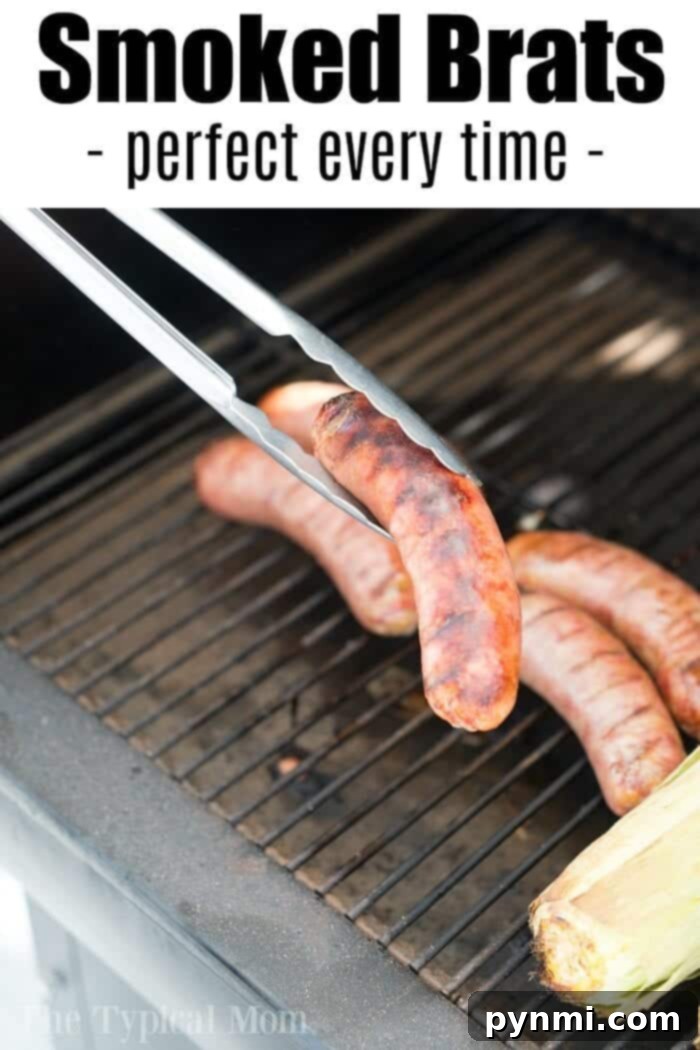 Smoked brats on a plate with various condiments