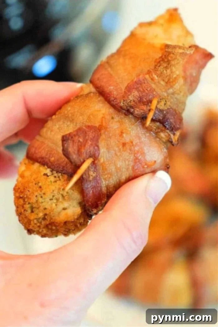 Golden Crispy Ninja Foodi Chicken Tenders 2 homemade ninja foodi chicken tenders wrapped in bacon