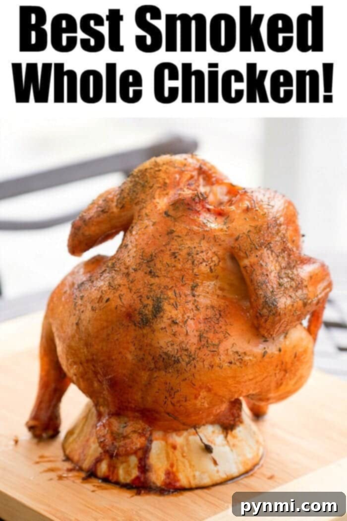 A perfectly Smoked Beer Can Chicken, golden brown and juicy, presented on a platter with fresh herbs.