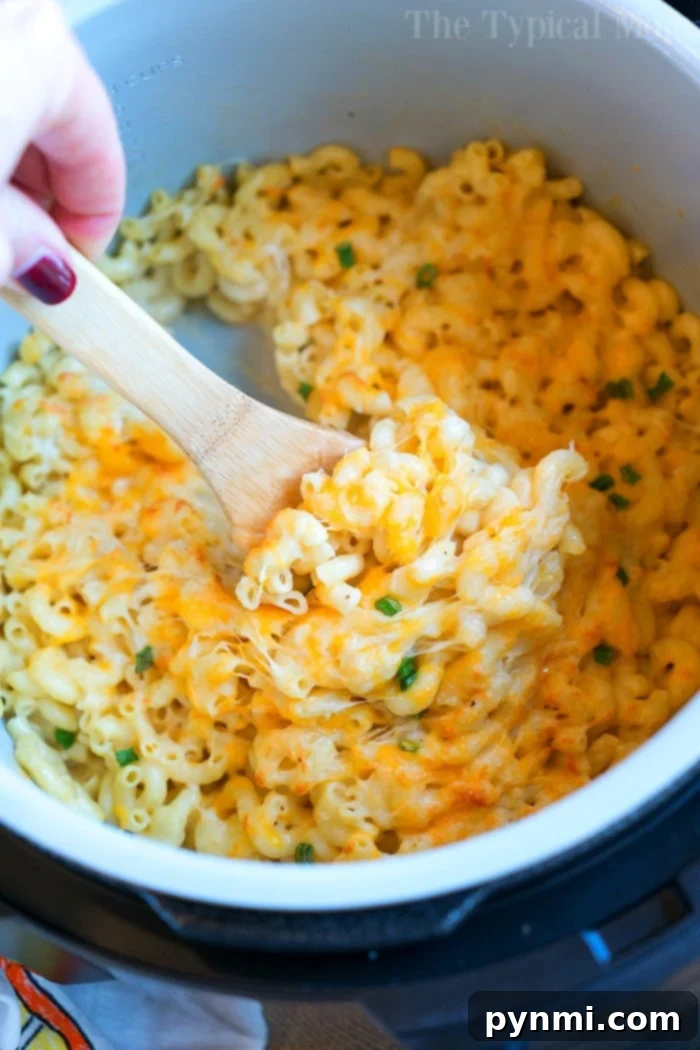 Ninja Foodi mac and cheese with a golden, crispy cheese topping