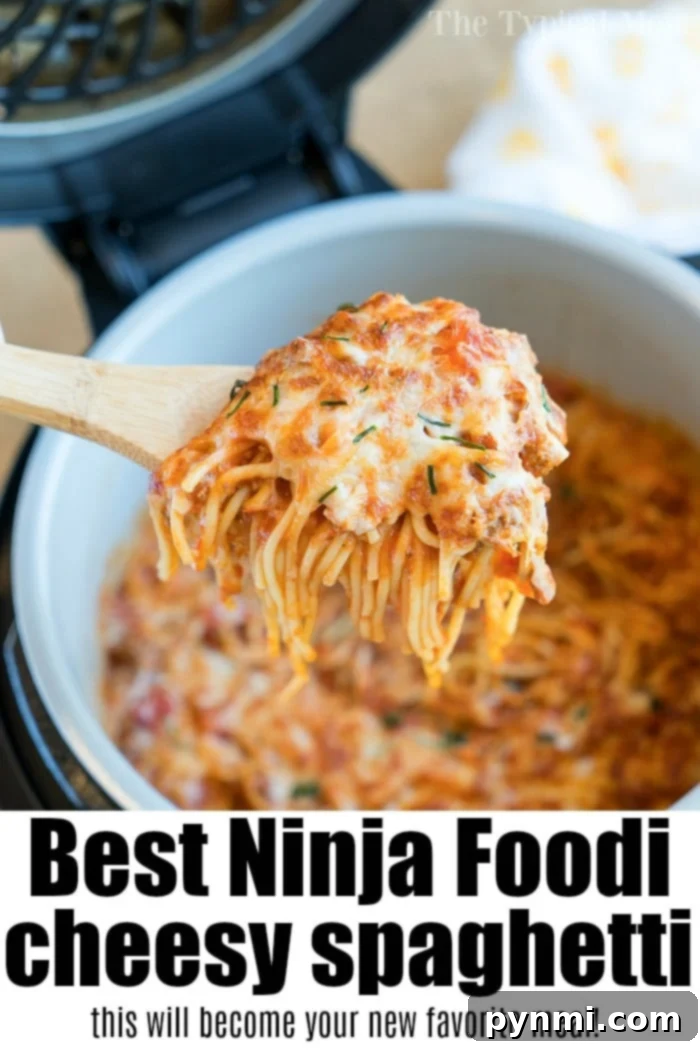 Ninja Foodi spaghetti: Delicious, cheesy one-pot dinner made easy with pressure cooker and air fryer functions. #ninjafoodi #ninjafoodirecipes #bakedspaghetti #spaghetti #cheesy #airfryer #pressurecooker #crockpotexpress #aircrisp #pasta cheesy ninja foodi spaghetti