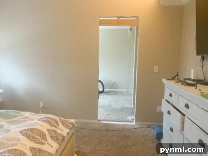 The initial phase of converting a bedroom into a closet, showing the empty space before renovation.