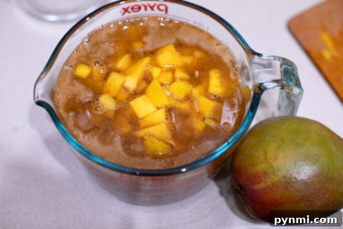 Succulent Braised Pork Roast 6 Delicious mango rice, a sweet and savory side dish, perfectly complementing a rich pork roast.