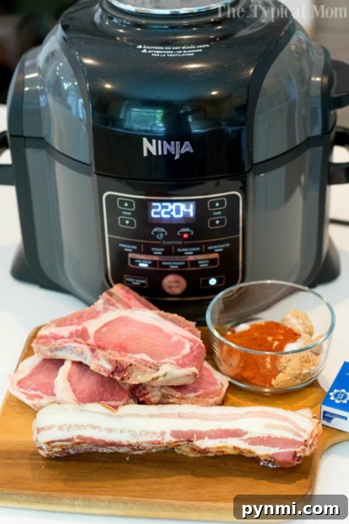 Explore Ninja Foodi air fryer pork chop recipe ideas: one wrapped in savory bacon with no breading, and another lightly breaded for extra texture. Both are delicious and easy for dinner! #porkchops #airfryer #airfryerrecipe #ninjafoodi #ninjafoodirecipes #breaded #bacon Ninja Foodi pork chops - unbreaded and bacon-wrapped