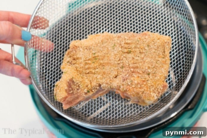 Perfectly cooked air fryer pork chops. Delicious air fryer pork chops, crispy and ready to serve