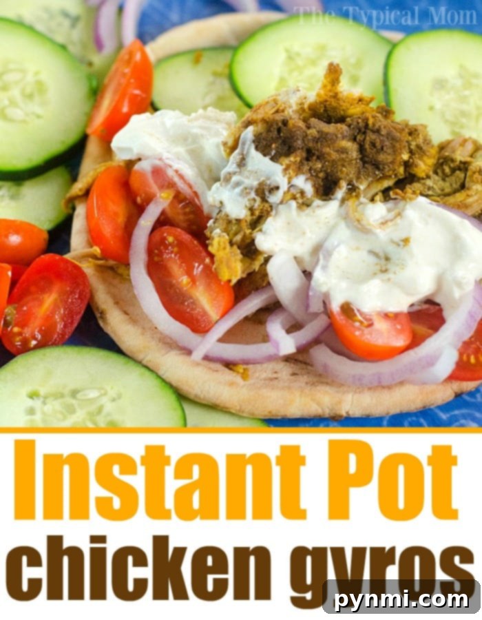 Delicious Instant Pot chicken gyros with vibrant fresh toppings and a creamy sauce