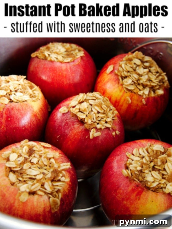 Delicious Instant Pot baked apples, glistening with cinnamon and sugar, garnished with a sprig of mint, ready for a healthy and warm dessert.