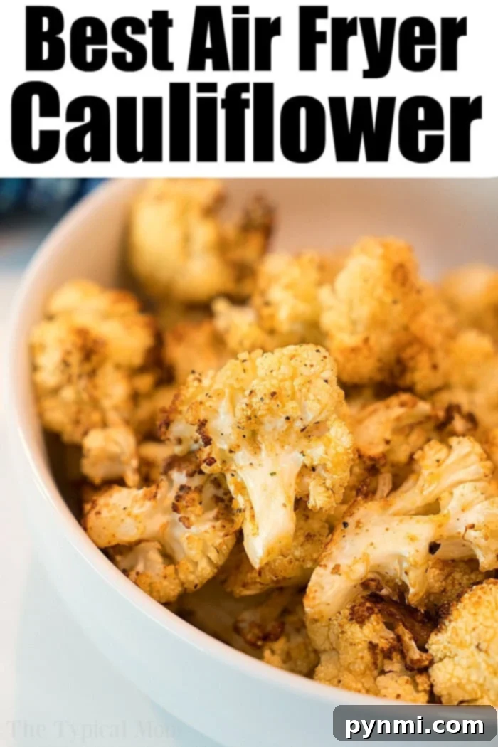 Air fryer cauliflower is easy to make in your Ninja Foodi or other machine. Healthy and full of flavor it's a great vegetable side dish or snack. #airfryer #ninjafoodi #cauliflower #vegetables #vegetarian #sidedish A vibrant close-up of beautifully seasoned, crispy air fryer cauliflower on a plate.