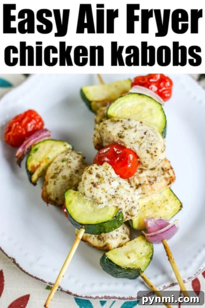 Golden Air Fryer Chicken Kabobs with colorful vegetables, served fresh.