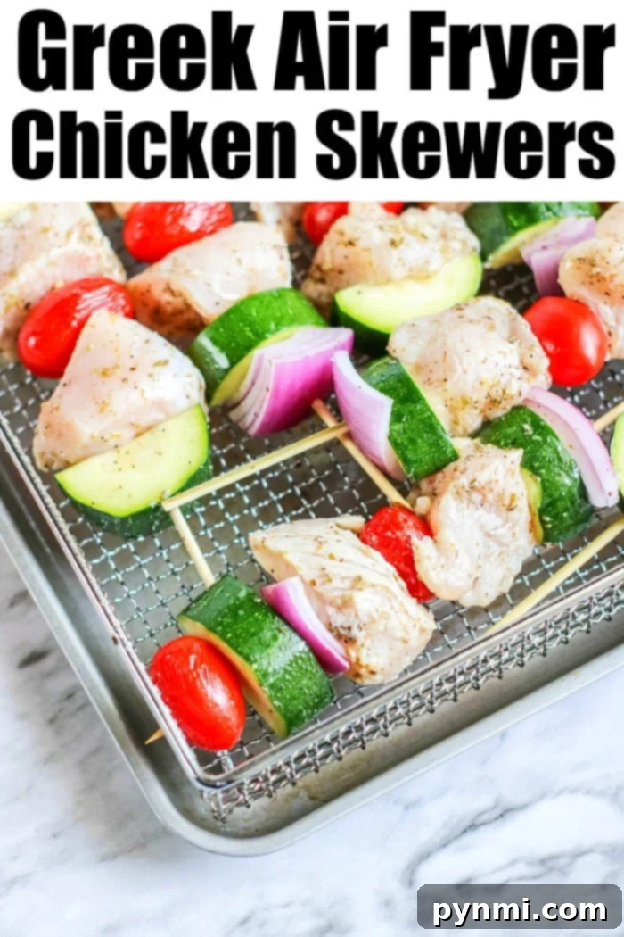 Close-up of Greek Air Fryer Chicken Kabobs, marinated and ready to eat.