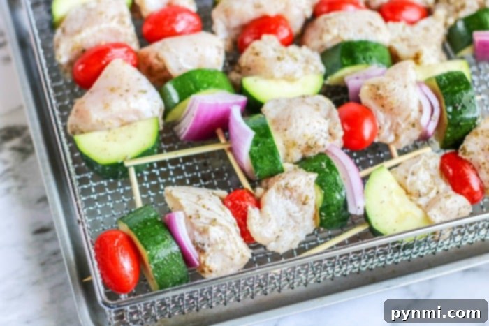 A selection of healthy air fryer chicken recipes, including kabobs.