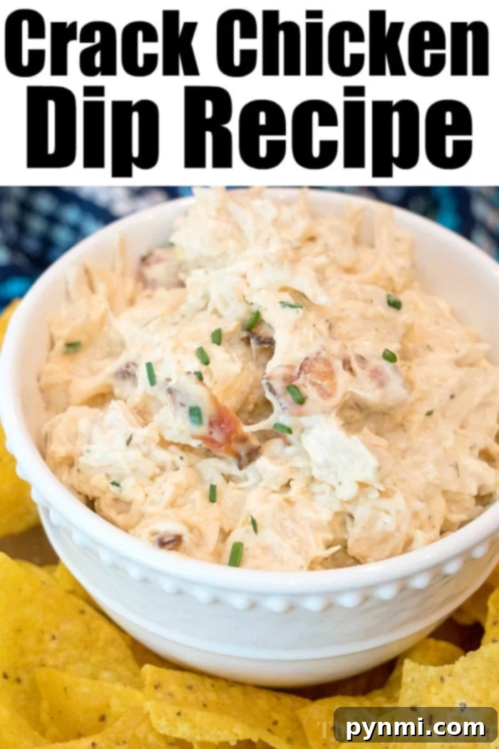 Pressure cooker crack chicken dip is the best appetizer ever! Served with chips or with bruschetta it's a cream cheese chicken snack your party guests will love. #crackchicken #dip #crack #chicken #creamcheese #party A vibrant and delicious Pressure Cooker Crack Chicken Dip, garnished with fresh herbs and served in a decorative bowl with various dippers for a perfect party appetizer.