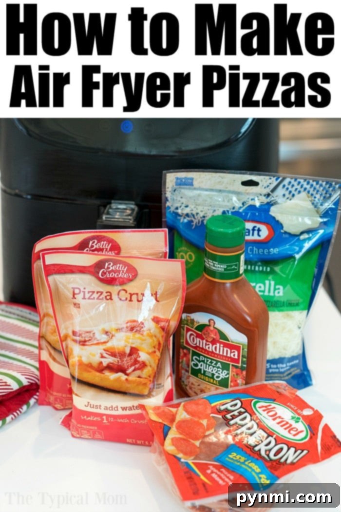 Two mini air fryer pizzas topped with pepperoni and olives.