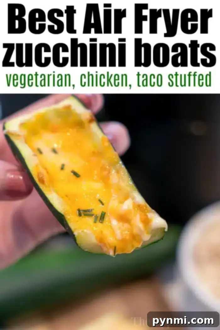 A hand holding a perfectly cooked air fryer zucchini boat brimming with melted cheese, herbs, and ground beef. The dish is presented as a delicious, healthy, and versatile meal option.