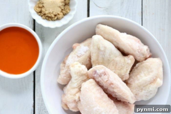 Crispy Air Fryer Frozen Chicken Wings 4 Crispy frozen air fryer wings, ready for seasoning or sauce.
