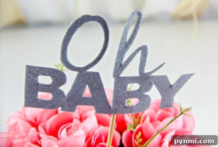 Detailed shot of arranging flowers into a pool noodle base for a baby shower centerpiece.