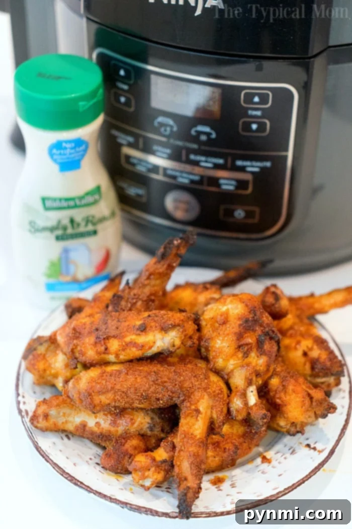 Perfectly cooked air fryer chicken wings from a Ninja Foodi.