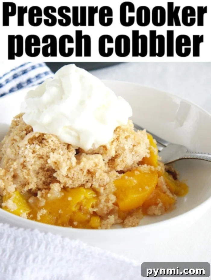 Pressure cooker peach cobbler you can make in your pressure cooker in no time. The perfect fruit dessert with a crumble topping you've got to try tonight! Bowl of Instant Pot peach cobbler with a spoon.