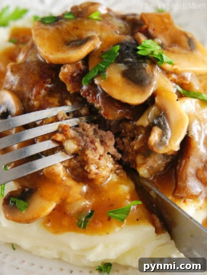 Effortless Instant Pot Salisbury Steak 2 Instant Pot Salisbury Steak with mushroom gravy over mashed potatoes