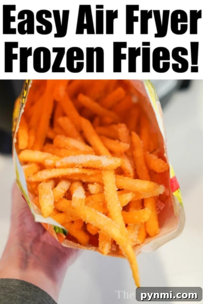 Air fryer frozen french fries cooking in the basket
