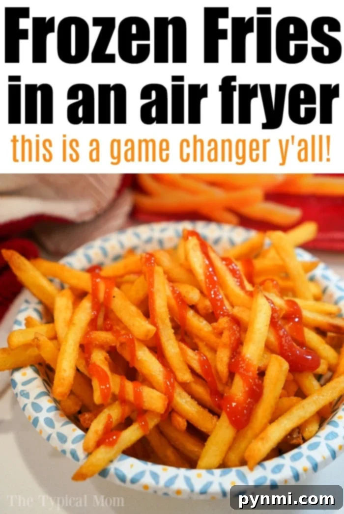 Close-up of crispy frozen french fries in an air fryer basket