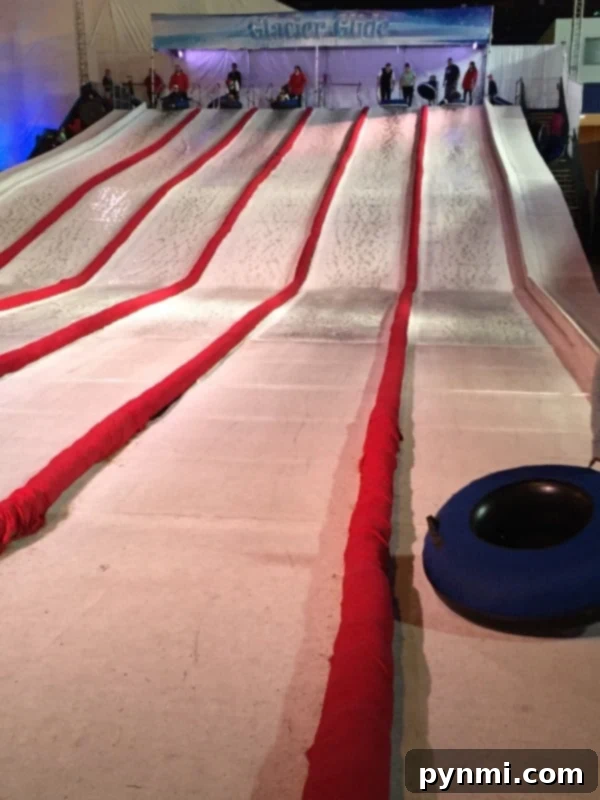 Family enjoying tubing at Queen Mary CHILL's outdoor attractions.