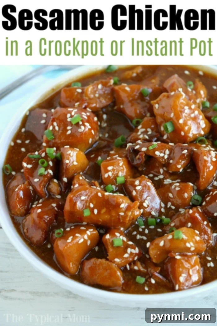 Crockpot sesame chicken recipe is here! Sticky honey sweet chicken thighs or breasts with a kick served on top of a bed of rice will be your favorite slow cooker meal. #crockpot #crockpotrecipes #sesamechicken #chicken #crockpotchicken #honey Cooked slow cooker sesame chicken, ready to be sauced.