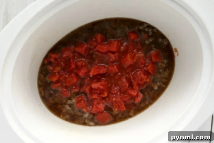 A cozy scene of Crockpot Chili Mac simmering, highlighting the ease of slow cooker recipes.