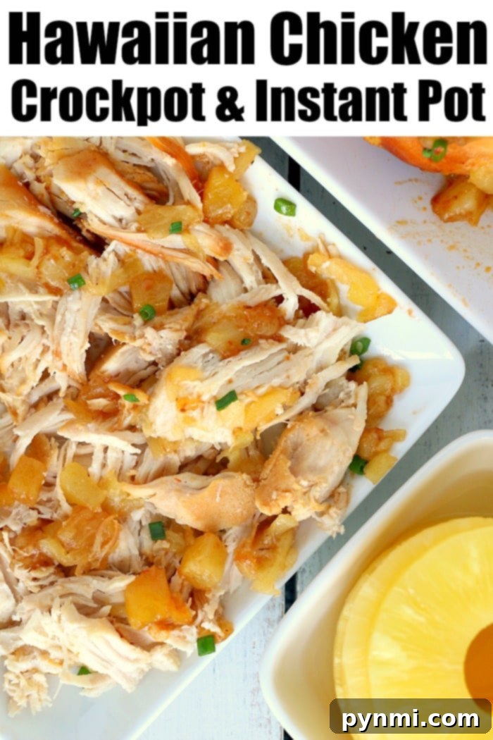 Crockpot or Instant Pot Hawaiian chicken has only 5 ingredients! Some call this slow cooker pineapple chicken because it's sweet with a bit of a barbecue kick to it! #crockpotrecipeseasy #crockpotrecipes #slowcookerrecipes #hawaiianchicken #pineapplechicken A beautifully plated serving of Hawaiian chicken, perfectly shredded and coated in its rich, sweet, and savory sauce, garnished with fresh herbs, and accompanied by pineapple chunks, ready to be enjoyed.
