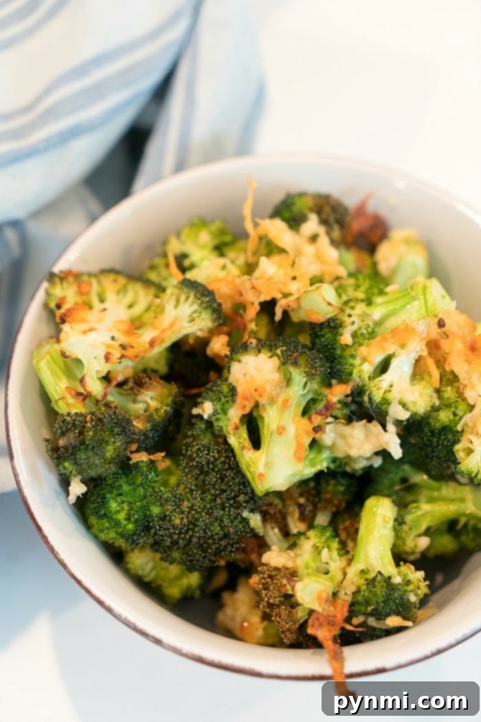 Cooking broccoli in air fryer is quite easy. Toss it in parmesan and olive oil for a crispy cheesy taste that's a great side dish with any meal. #airfryerrecipes #ninjafoodirecipes #foodi #foodirecipes #airfryerbroccoli #broccoli #airfryervegetables #ninjafoodibroccoli Parmesan broccoli dish, a healthy and delicious air fryer option