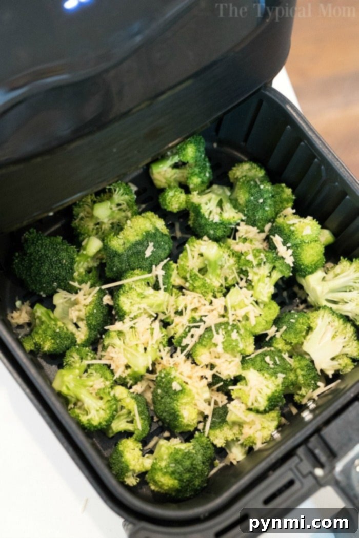 Air fryer broccoli is quite easy. Toss it in parmesan and olive oil for a crispy cheesy taste that's a great side dish with any meal. #airfryerrecipes #ninjafoodirecipes #foodi #foodirecipes #airfryerbroccoli #broccoli #airfryervegetables #ninjafoodibroccoli Best broccoli prepared in an air fryer, golden and inviting
