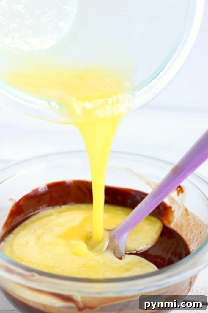 Air fryer cake recipe being prepared, showing ramekins in the air fryer basket