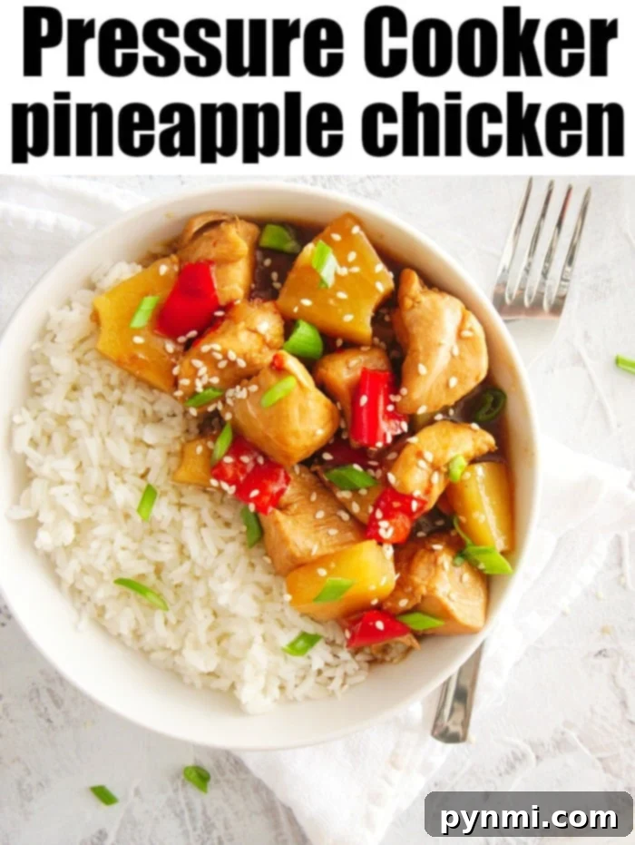 Delicious pressure cooker pineapple chicken served over rice